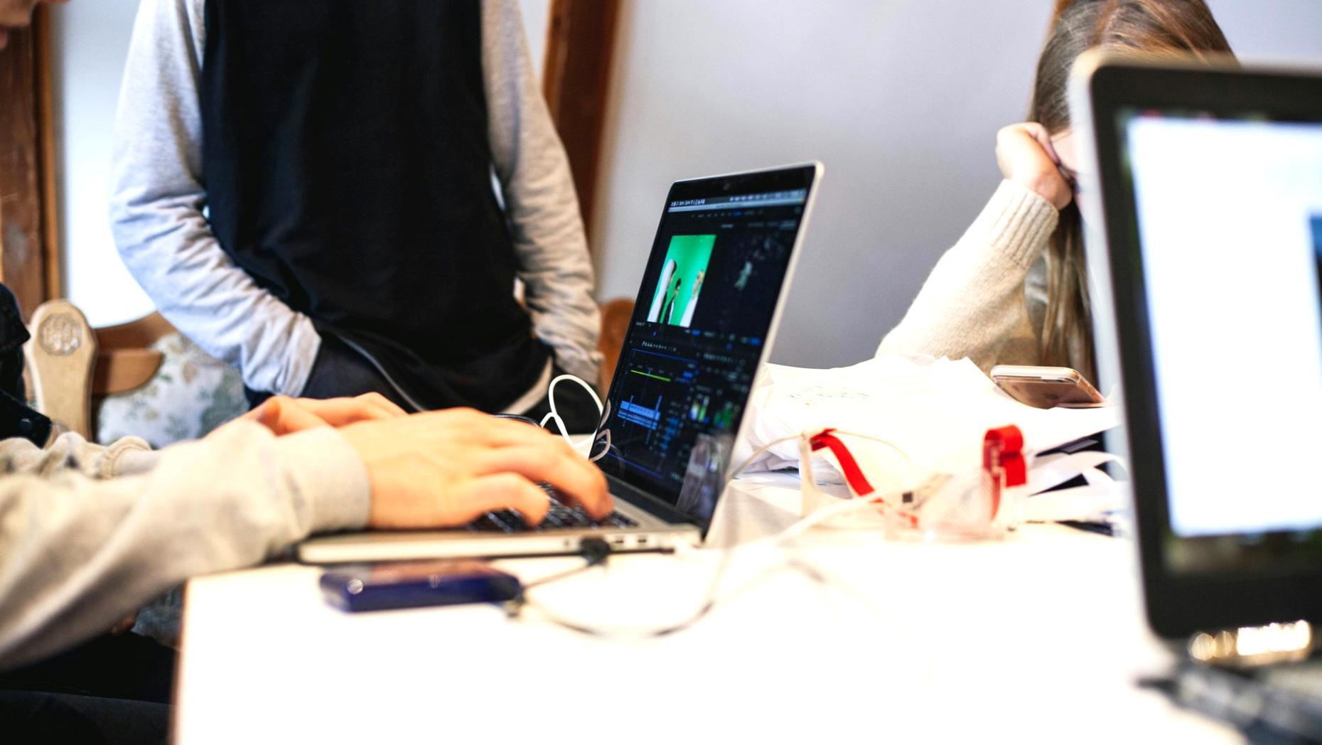 Team working on financial projections using our platform